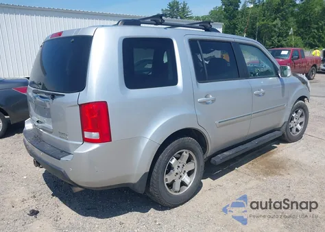 2010 Honda Pilot Touring z USA, uszkodzony, nr VIN 5FNYF4H94AB010058